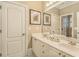 Bright bathroom with double sinks, a decorative object, and neutral paint to highlight a clean aesthetic at 2672 Brickell Square, Atlanta, GA 30341