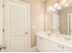 This bathroom offers a dual vanity with white countertops, a decorative message, and neutral paint at 2672 Brickell Square, Atlanta, GA 30341