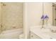 This bathroom offers a tub/shower combination, toilet, single vanity, and calming paint at 2672 Brickell Square, Atlanta, GA 30341