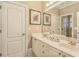 The bathroom has a double sink vanity and a decorative sculpture on the counter at 2672 Brickell Square, Atlanta, GA 30341