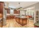 Bright kitchen with granite countertops, stainless steel appliances, a kitchen island, and breakfast area at 2672 Brickell Square, Atlanta, GA 30341