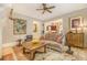 Comfortable living room showcasing hardwood floors, fireplace, and open flow to the kitchen at 2672 Brickell Square, Atlanta, GA 30341