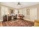 This office has a large oriental rug and dual windows with plantation shutters at 2672 Brickell Square, Atlanta, GA 30341