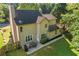 Aerial view of backyard with patio and dining set at 3220 Goldmist Dr, Buford, GA 30519