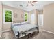 A light-filled bedroom boasts neutral walls and plush carpeting at 3220 Goldmist Dr, Buford, GA 30519