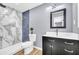 Modern bathroom with marble shower and a contemporary vanity at 6684 Heathrow Ln, Stone Mountain, GA 30087
