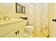 Bathroom featuring a vanity with marble countertop and a shower with a decorative curtain at 1005 Woodbury Rd, Canton, GA 30114