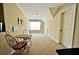 Bonus room with carpet flooring and a bistro set at 1005 Woodbury Rd, Canton, GA 30114