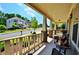 Inviting front porch with seating and a view of the neighborhood street at 1005 Woodbury Rd, Canton, GA 30114