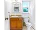 Bathroom with tub, toilet, and single sink vanity at 21 Wisteria Run, Hiram, GA 30141