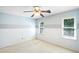 Bedroom with ceiling fan and two windows at 21 Wisteria Run, Hiram, GA 30141