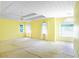 Spacious main bedroom featuring tray ceilings and lots of windows for natural light at 21 Wisteria Run, Hiram, GA 30141