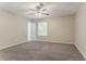 Bedroom featuring carpeted floors, natural light, and access to an en suite bathroom at 2469 Newgate Dr, Decatur, GA 30035