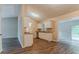 Contemporary kitchen featuring white cabinets, granite countertops, stainless steel appliances and access to the deck at 2469 Newgate Dr, Decatur, GA 30035