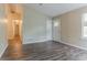 Living room with wood flooring, high ceilings and neutral paint colors at 2469 Newgate Dr, Decatur, GA 30035