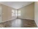 Open living room with lots of natural light and wood flooring throughout at 2469 Newgate Dr, Decatur, GA 30035