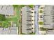 Birds eye view of townhome rooftops showing backyard space, landscaping and street view at 2647 Sardis Chase Ct, Buford, GA 30519