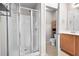 Bathroom showcasing double sinks, shower, and separate toilet area at 2647 Sardis Chase Ct, Buford, GA 30519