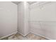 Walk-in closet with wire shelving and neutral walls at 2647 Sardis Chase Ct, Buford, GA 30519