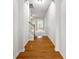 Inviting entryway with hardwood floors and arched doorway leading to the living space at 2647 Sardis Chase Ct, Buford, GA 30519
