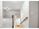 Upstairs hallway with carpet flooring and a view of the stairs at 2647 Sardis Chase Ct, Buford, GA 30519