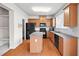 Functional kitchen with stainless steel appliances and hardwood flooring at 2647 Sardis Chase Ct, Buford, GA 30519