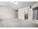 Spacious main bedroom with neutral walls, carpet floors, walk-in closet, and attached bath at 2647 Sardis Chase Ct, Buford, GA 30519