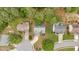 An aerial view of a home featuring a manicured lawn, mature trees, and a circular driveway at 10 Bayberry Ct, Acworth, GA 30101