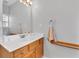 Bathroom featuring a vanity with sink, grab bar, and towel in a well-lit space at 10 Bayberry Ct, Acworth, GA 30101