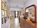 Hallway showing the layout of a main bedroom with multiple decorative pictures at 10 Bayberry Ct, Acworth, GA 30101
