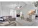 Open-concept living space features a fireplace, vaulted ceilings, and modern design at 10 Bayberry Ct, Acworth, GA 30101