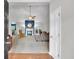 Bright, open living room with fireplace, vaulted ceilings, and French doors at 10 Bayberry Ct, Acworth, GA 30101