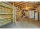 Unfinished basement area with exposed duct work, shelving and mechanical components at 2821 Highway 11, Mansfield, GA 30055