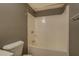 Well-maintained bathroom featuring a bathtub-shower combo, tile flooring, and modern fixtures at 2821 Highway 11, Mansfield, GA 30055