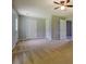 Spacious room with neutral carpet, neutral walls, several doors, and a ceiling fan for added comfort at 2821 Highway 11, Mansfield, GA 30055