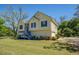 Charming two-story home with a well-manicured lawn and attached garage at 2821 Highway 11, Mansfield, GA 30055