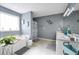 Bright bathroom featuring a soaking tub, double vanity, and elegant decorative touches for a relaxing spa-like experience at 70 Lake Charles Xing, Covington, GA 30016