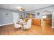 Cozy dining area with a glass table and four chairs, perfect for intimate gatherings at 70 Lake Charles Xing, Covington, GA 30016