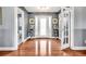 Inviting foyer features hard wood floors, neutral walls and french doors at 70 Lake Charles Xing, Covington, GA 30016