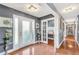 Charming foyer with decorative glass front door and light gray walls at 70 Lake Charles Xing, Covington, GA 30016