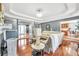 Stylish living room showcasing an open layout, hardwood floors, and an inviting fireplace feature at 70 Lake Charles Xing, Covington, GA 30016