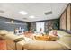Spacious living room features a cozy fireplace, stylish decor, and comfortable seating at 70 Lake Charles Xing, Covington, GA 30016
