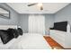 Comfortable bedroom features warm hardwood floors, and a large window, creating a relaxing atmosphere at 70 Lake Charles Xing, Covington, GA 30016