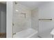 Modern bathroom with updated tile shower and gold shower fixtures at 1819 Waldrep Se Cir, Marietta, GA 30060