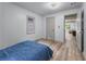 Serene bedroom with wood floors and soft blue bedding, showcasing a peaceful retreat at 1819 Waldrep Se Cir, Marietta, GA 30060
