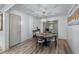 Charming dining room featuring modern light fixture and wood flooring at 1819 Waldrep Se Cir, Marietta, GA 30060