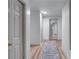 Well-lit hallway features hardwood floors and classic decor elements at 1819 Waldrep Se Cir, Marietta, GA 30060