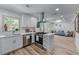 Beautiful kitchen features white cabinets and modern appliances at 1819 Waldrep Se Cir, Marietta, GA 30060