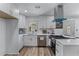 Modern kitchen with stainless steel appliances and white cabinetry at 1819 Waldrep Se Cir, Marietta, GA 30060