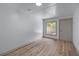 Bright room featuring wood floors, white walls, and a window for natural light at 1819 Waldrep Se Cir, Marietta, GA 30060